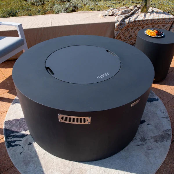 304 stainless steel burner pan lid for the Pacaya Fire Table outdoor fire pit on a patio